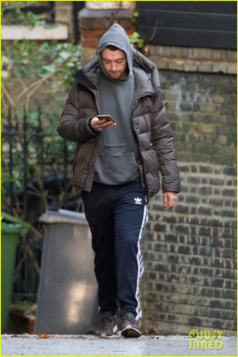 sam smith bundles up for a stroll in london 05