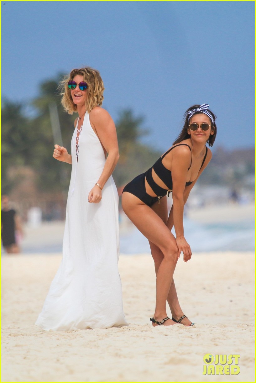 nina dobrev wears a swimsuit with zippers 10