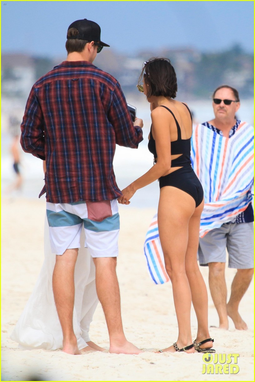nina dobrev wears a swimsuit with zippers 22