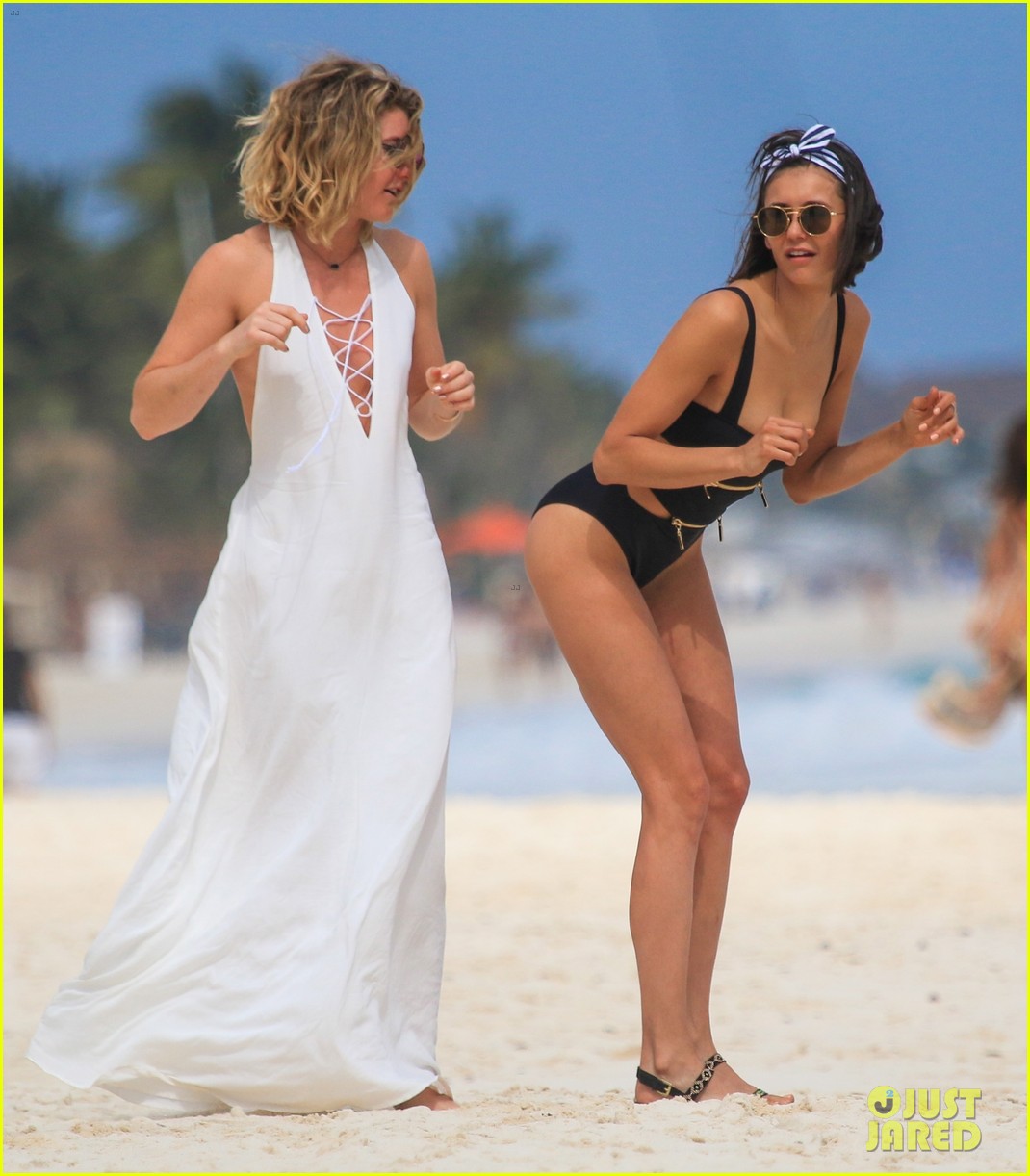 nina dobrev wears a swimsuit with zippers 31