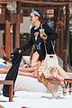 nina dobrev wears a swimsuit with zippers 16
