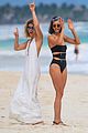 nina dobrev wears a swimsuit with zippers 17