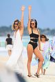 nina dobrev wears a swimsuit with zippers 20