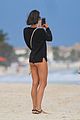 nina dobrev wears a swimsuit with zippers 45