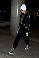 kaia gerber arrives in la in a new york beanie following paris fashion week 08