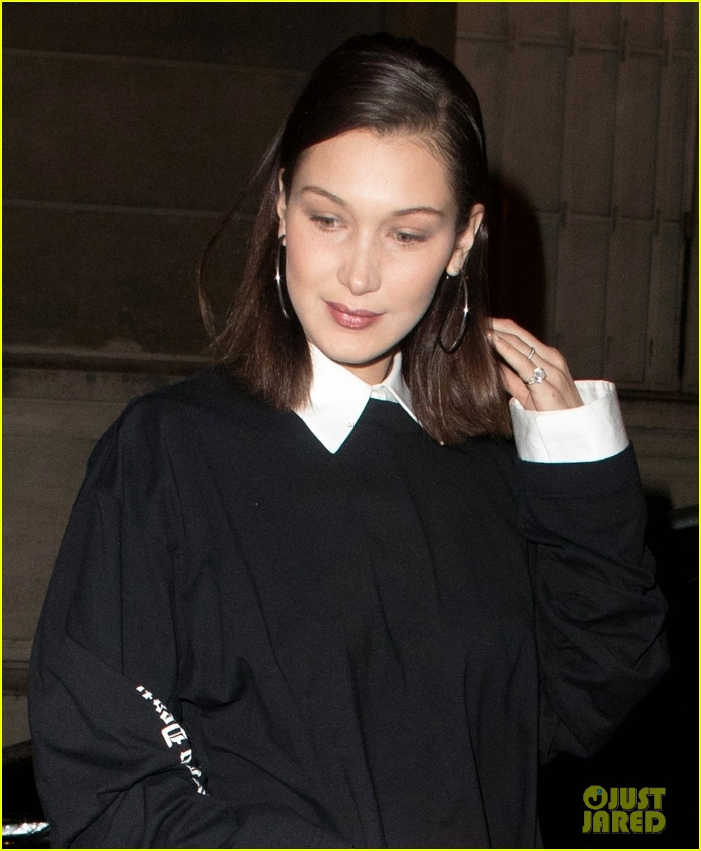 bella hadid sports little black dress and floral boots for night out in paris2 02