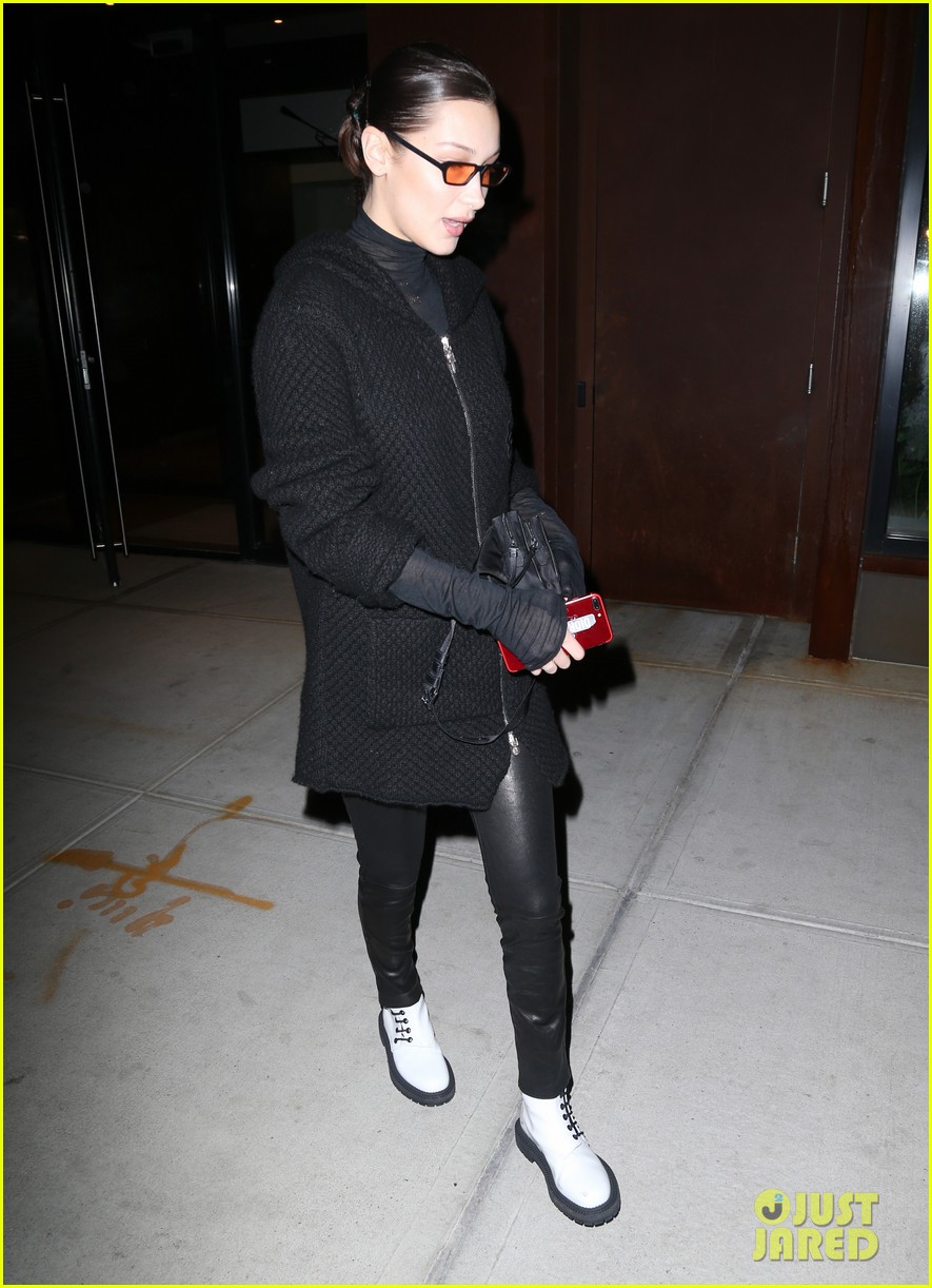 bella hadid sports black leather pants and white boots while out in nyc 01