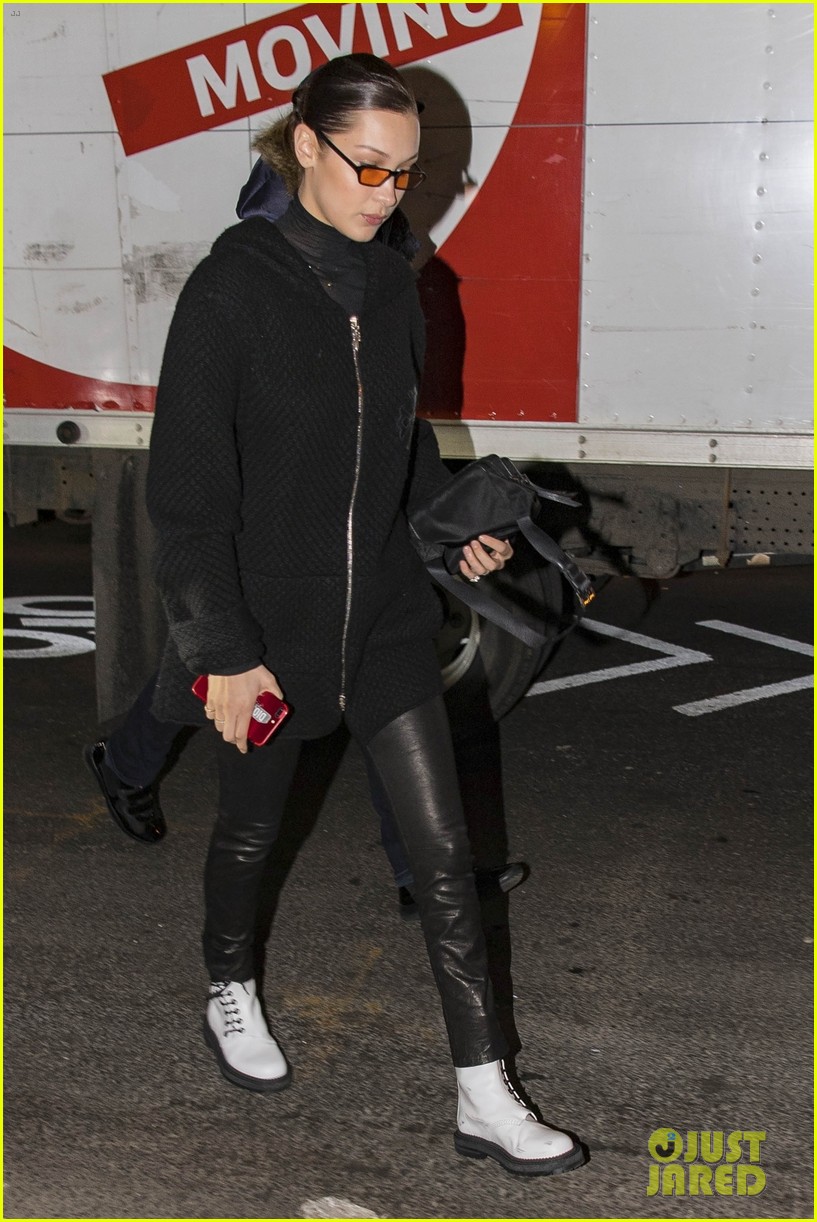 bella hadid sports black leather pants and white boots while out in nyc 06