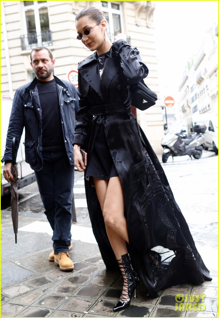 bella hadid channels the matrix while stepping out in paris 19