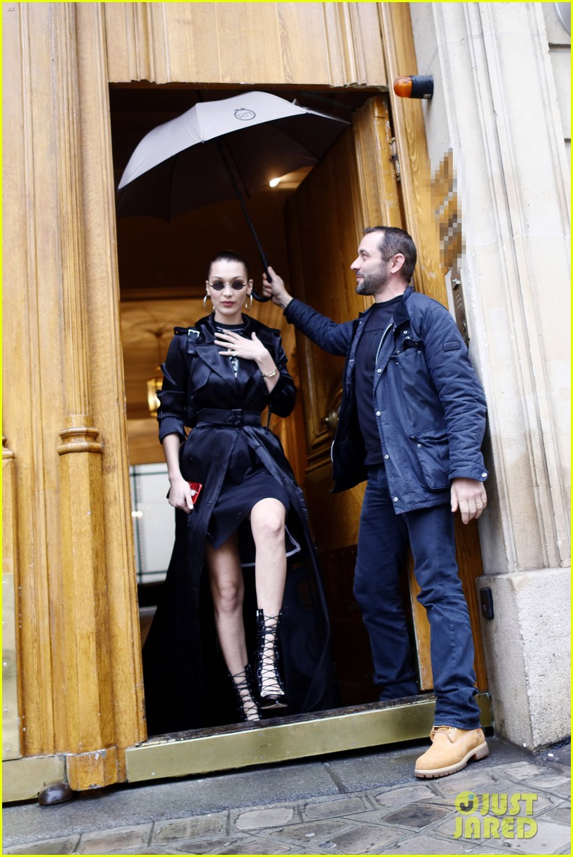 bella hadid channels the matrix while stepping out in paris 20
