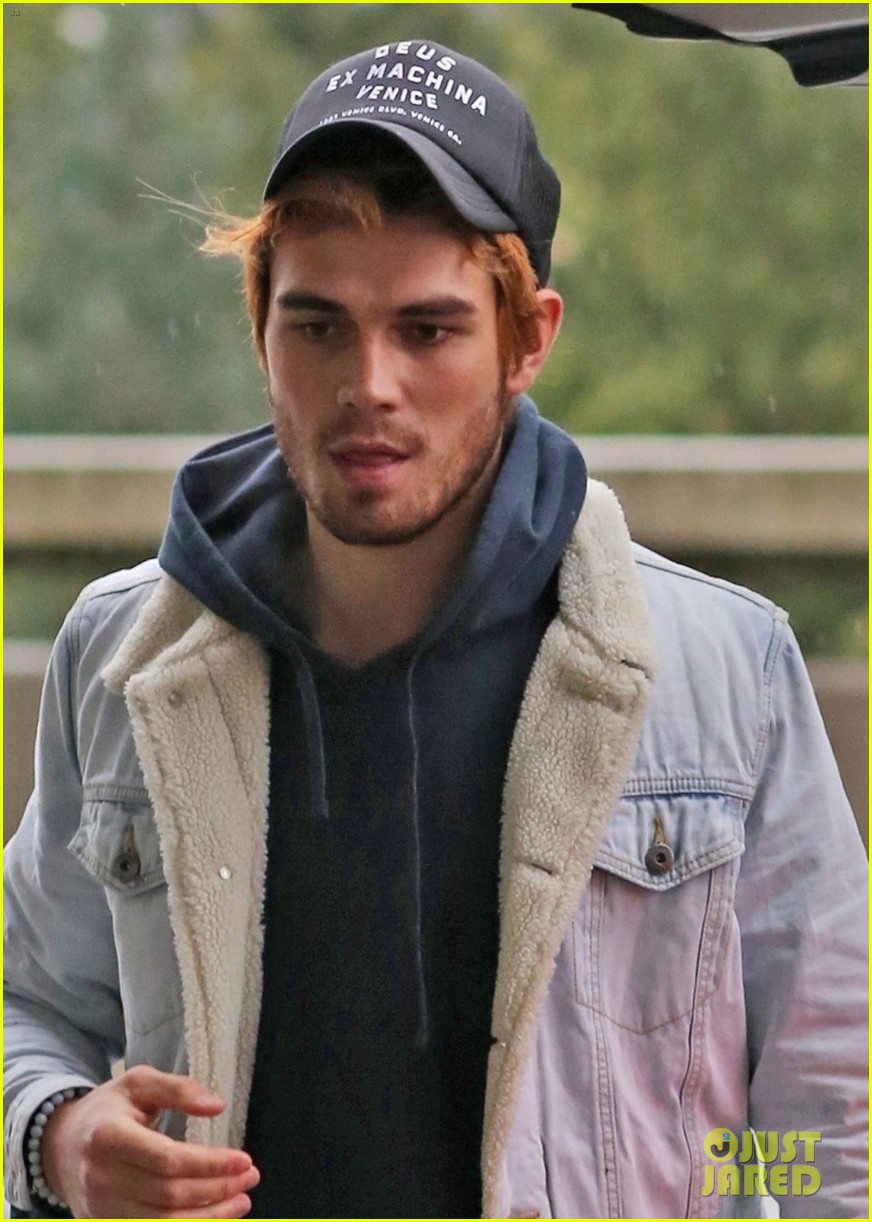 kj apa arrives in vancouver with mystery blonde 04