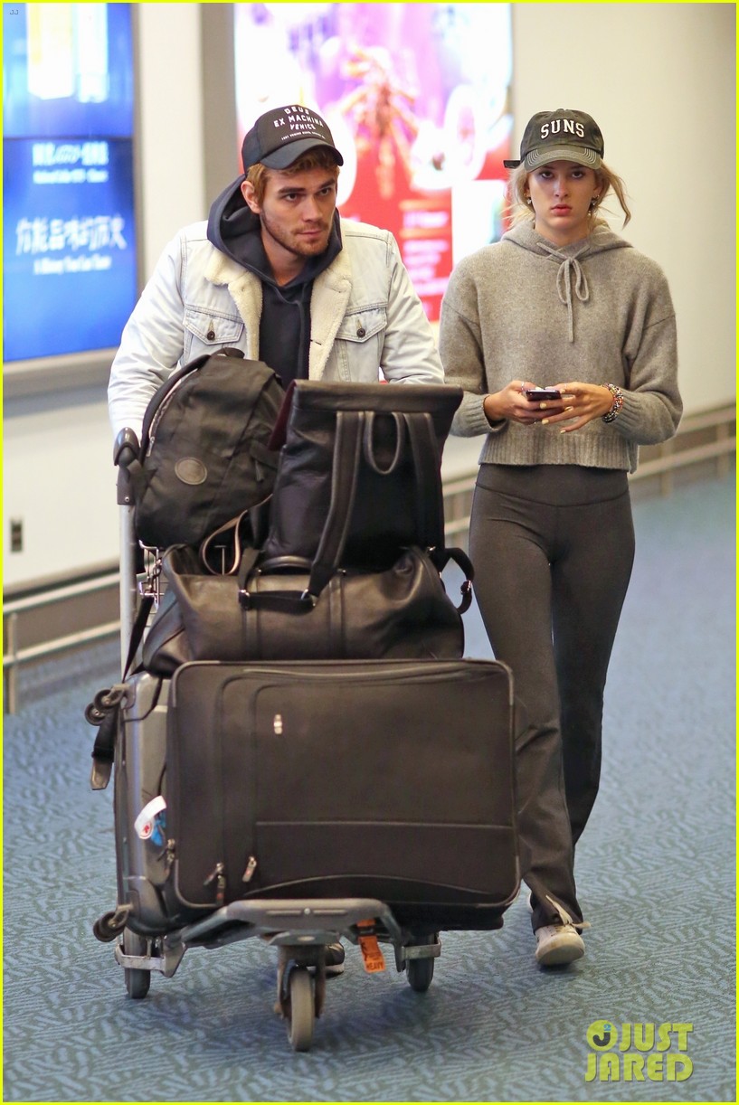 kj apa arrives in vancouver with mystery blonde 05