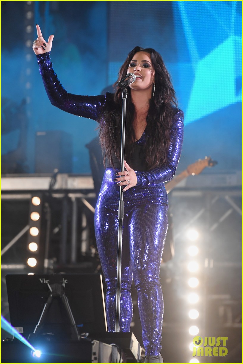demi lovato performs in a sequined jumpsuit for nye in miami 03