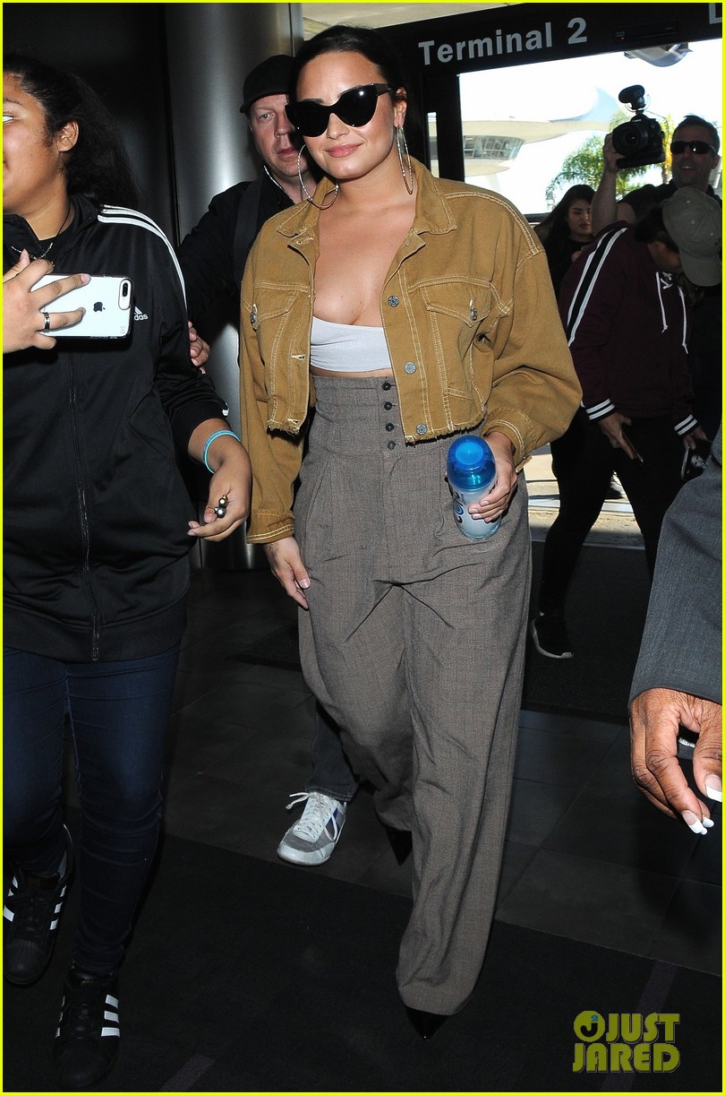 demi lovato rocks tiny top while catching flight out of lax 03