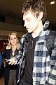 emma roberts and evan peters touch down in salt lake city ahead of sundance 09