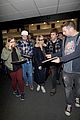 emma roberts and evan peters touch down in salt lake city ahead of sundance 27