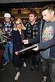emma roberts and evan peters touch down in salt lake city ahead of sundance 32