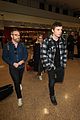 emma roberts and evan peters touch down in salt lake city ahead of sundance 35