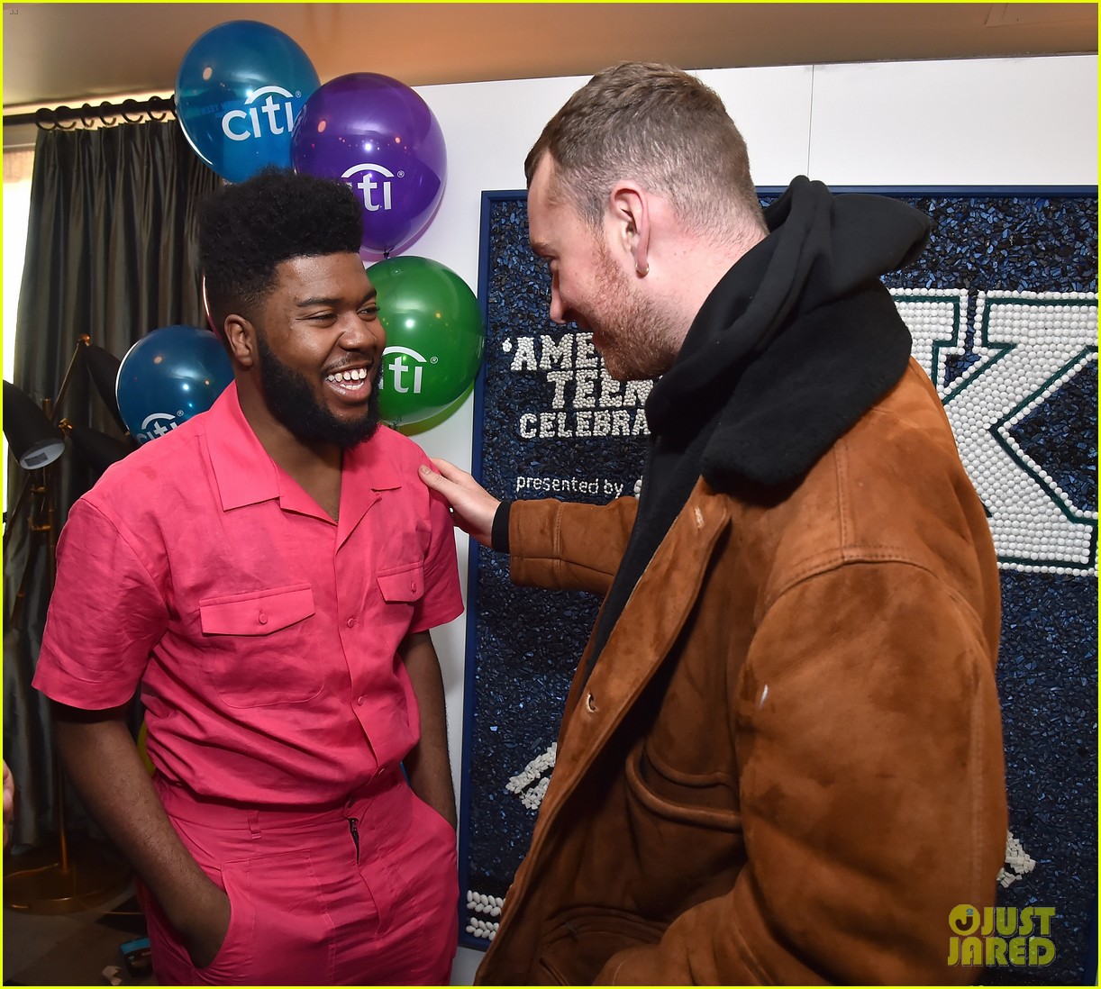 sam smith and khalid share a hug at american teen event2 03