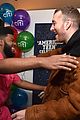 sam smith and khalid share a hug at american teen event2 02