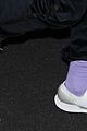 timothee chalamet rocks purple socks whiile departing from lax 03