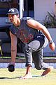 nick jonas joe jonas flaunt buff biceps playing lawn bowling in australia 03