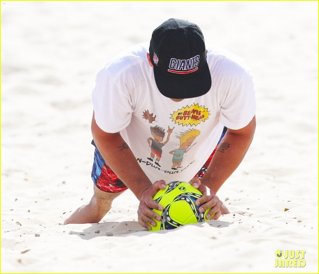 joe jonas plays soccer on the beach in sydney 02