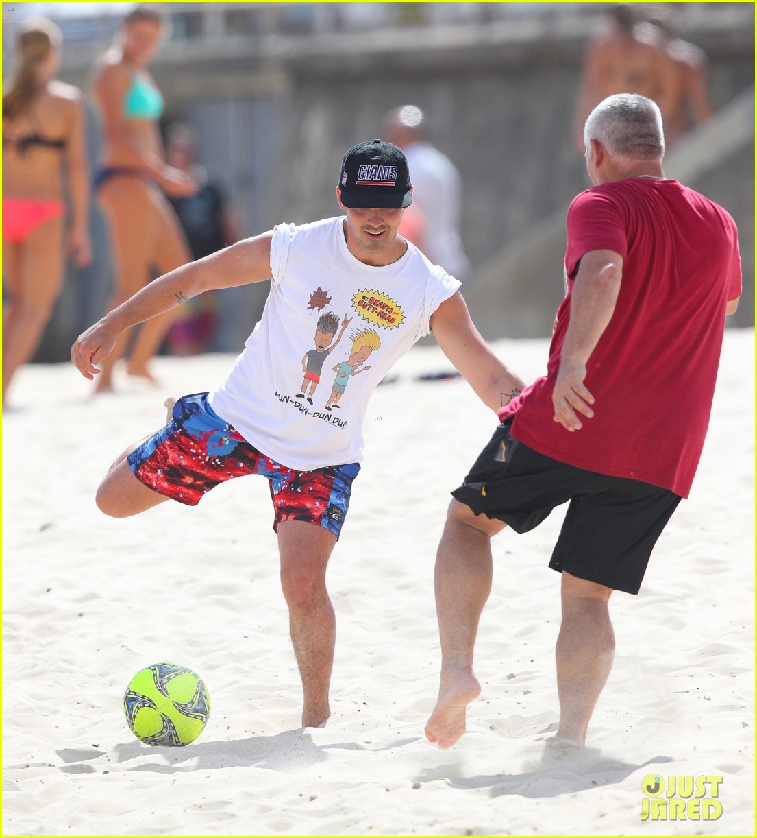 joe jonas plays soccer on the beach in sydney 10