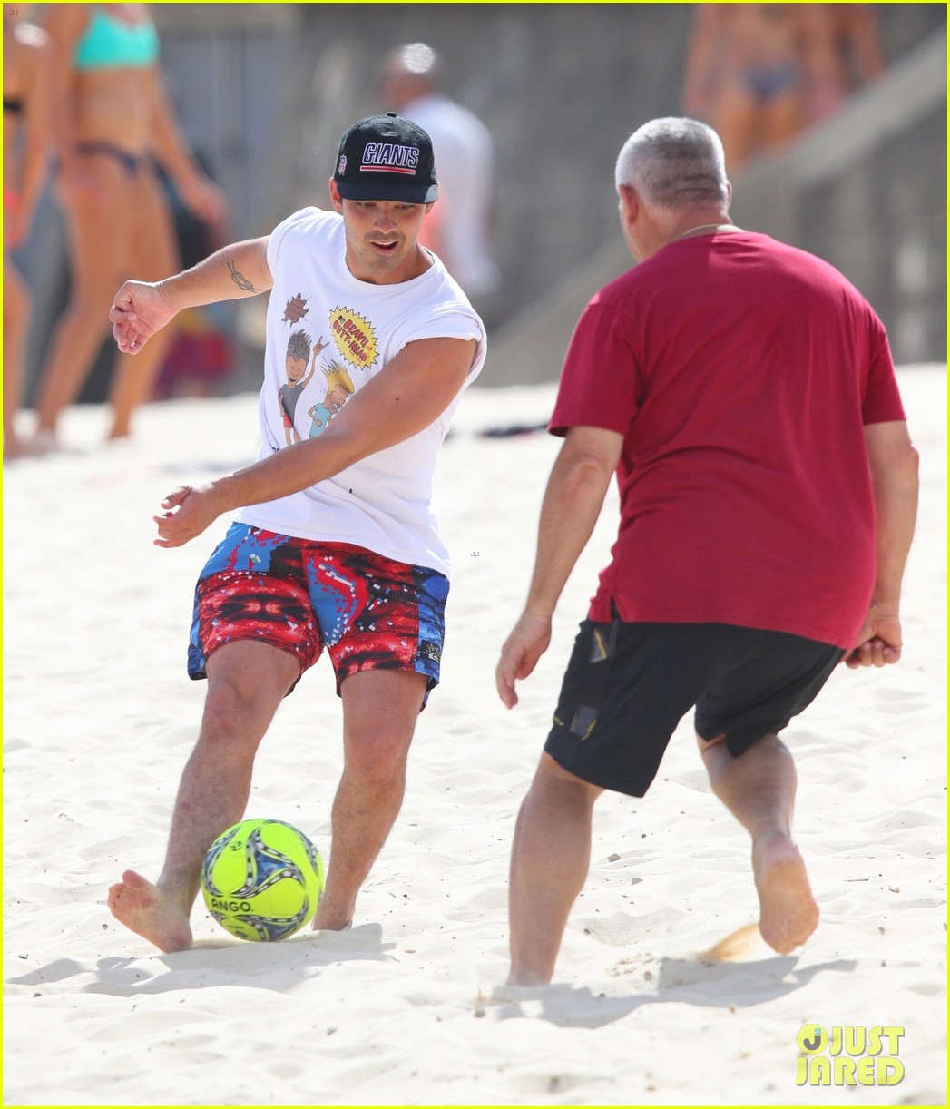 joe jonas plays soccer on the beach in sydney 12