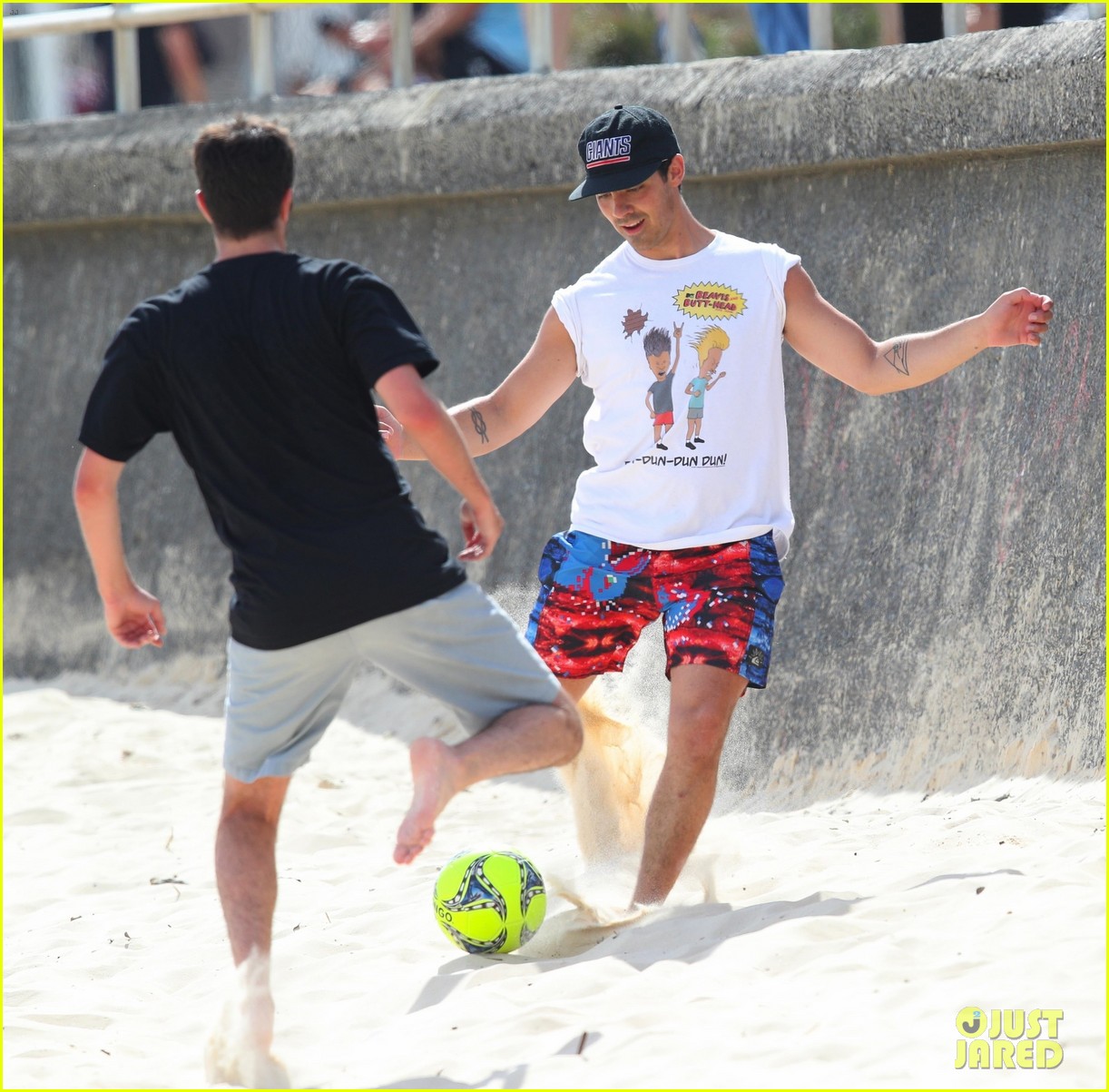 joe jonas plays soccer on the beach in sydney 16