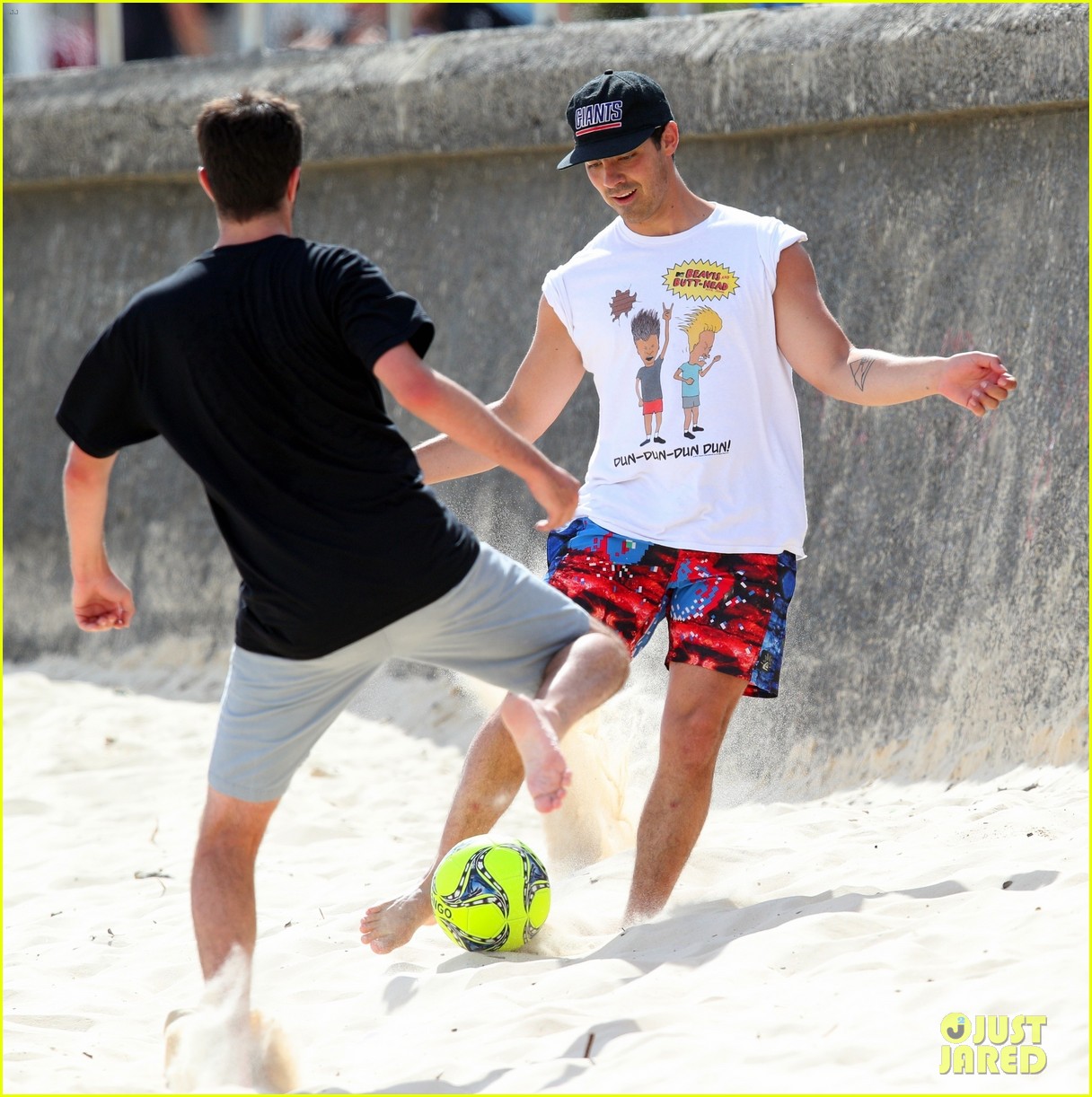 joe jonas plays soccer on the beach in sydney 17