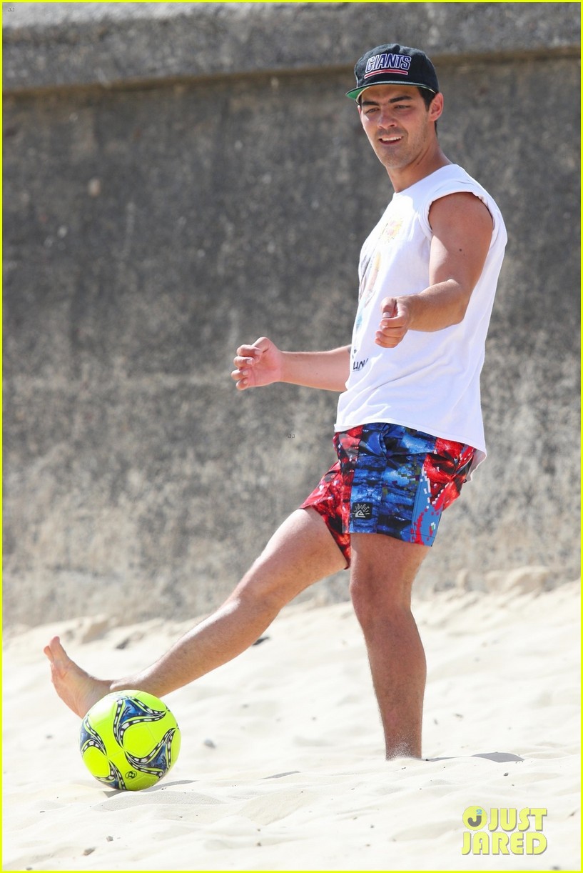 joe jonas plays soccer on the beach in sydney 23