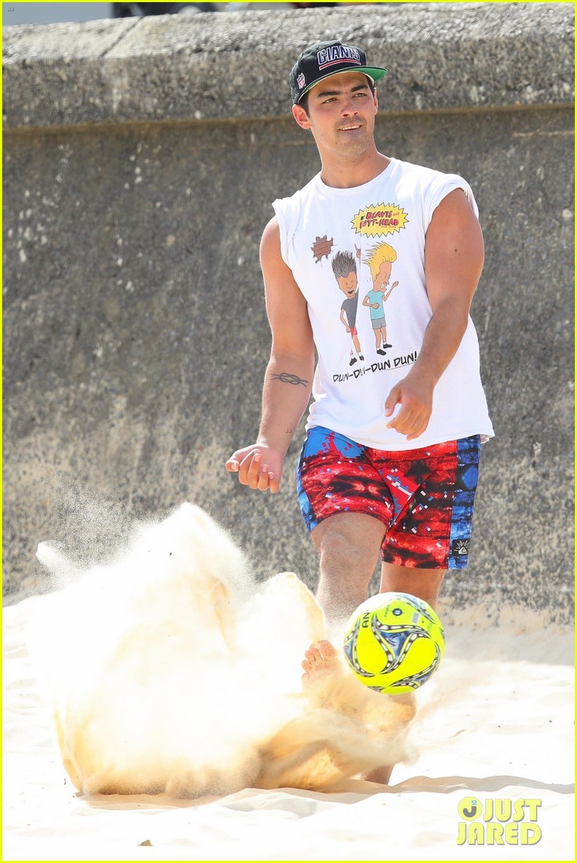 joe jonas plays soccer on the beach in sydney 33