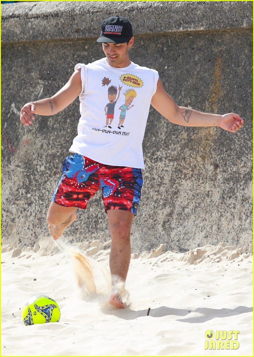 joe jonas plays soccer on the beach in sydney 38