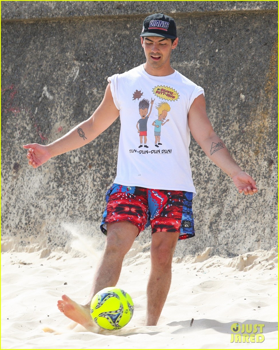 joe jonas plays soccer on the beach in sydney 41