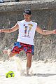joe jonas plays soccer on the beach in sydney 39