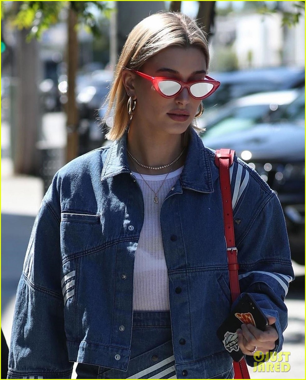 hailey baldwin dons semi sheer top and denim mini skirt for lunch in weho 02