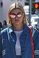 hailey baldwin dons semi sheer top and denim mini skirt for lunch in weho 04