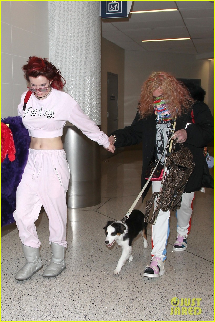 bella thorne arrives back in la with mod sun puppy 05