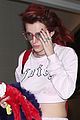 bella thorne arrives back in la with mod sun puppy 02