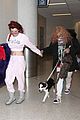 bella thorne arrives back in la with mod sun puppy 05