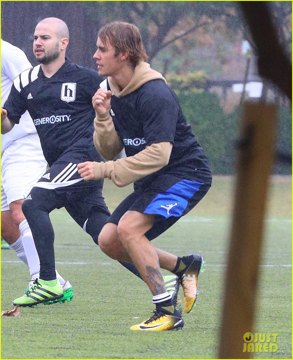 justin bieber shows off ihs soccer skills in the rain 05