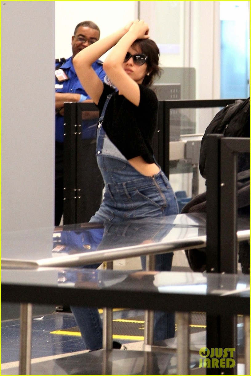 camila cabello strikes a pose going through airport security 05