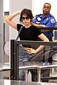 camila cabello strikes a pose going through airport security 03