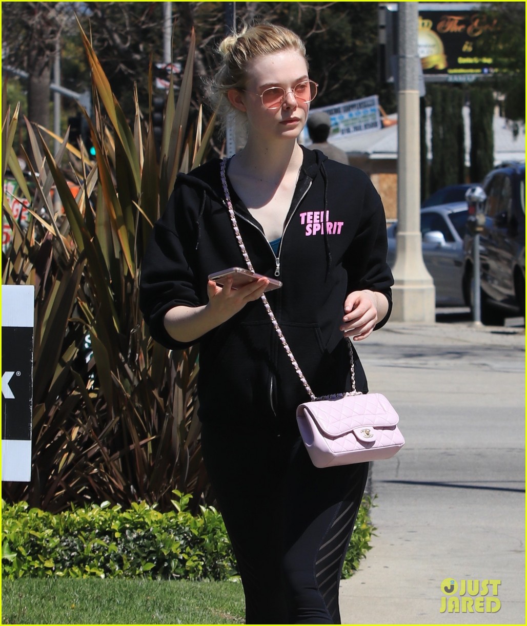elle fanning is all smiles for ice cream date with male friend 04