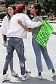 selena gomez and bella thorne share a hug at march for our lives 02