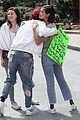 selena gomez and bella thorne share a hug at march for our lives 14