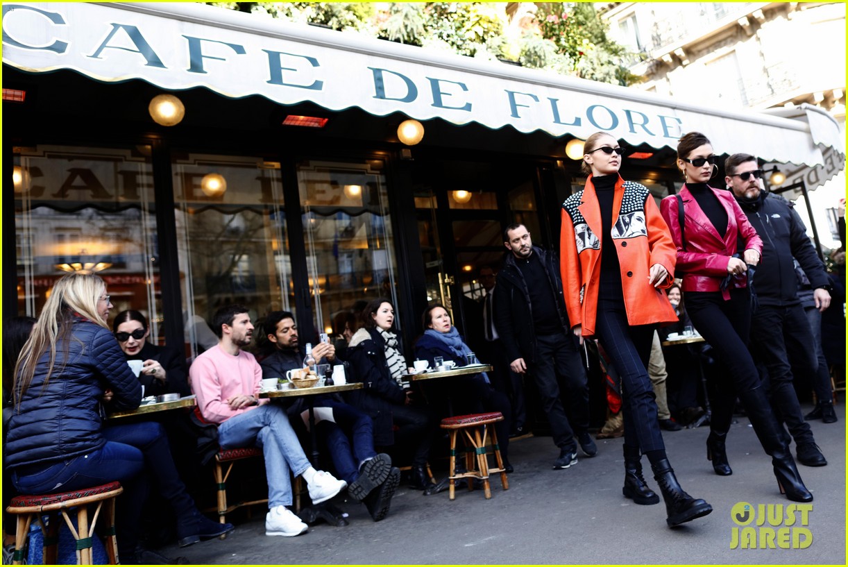 gigi and bella hadid rock bold colors at paris cafe 34