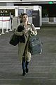 lucy hale carries rottweiler bag while traveling home for easter 01