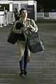 lucy hale carries rottweiler bag while traveling home for easter 04